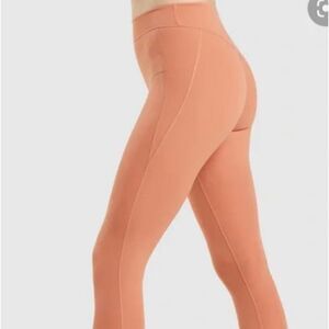 Gymshark Kathryn Kendra Pumpkin Athletic leggings size small. NWT
